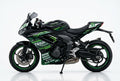 Triumph Daytona 660 green black decals on black paint side view
