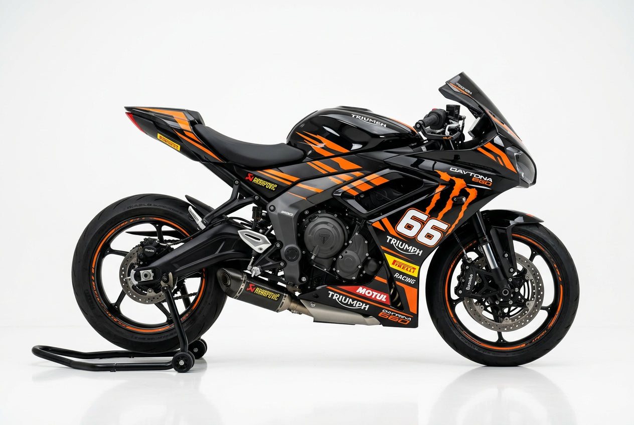 Triumph Daytona 660 orange black decals on black paint side view