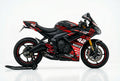 Triumph Daytona 660 red black decals on black paint side view