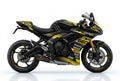 Triumph Daytona 660 yellow black decals on black paint side view