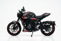 Triumph Trident 660 carbon red decals on black paint side view
