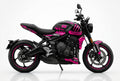 Triumph Trident 660 pink black decals on black paint side view