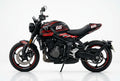 Triumph Trident 660 red black decals on black paint side view
